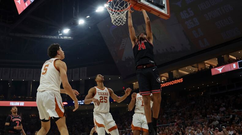 Georgia Bulldogs forward Asa Newell (14) scores during the SEC college basketball game between Texas Longhorns and Georgia Bulldogs on March 1, 2025, at Moody Center in Austin, Texas. (Photo by David Buono/Icon Sportswire) (Icon Sportswire via AP Images)