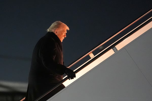 After a problem with the first plane, President Donald Trump took off overnight on another plane headed to Switzerland. (Evan Vucci/AP)