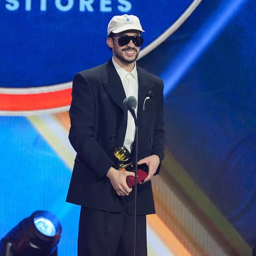 Bad Bunny accept the award for best urban song for "DtMF," during the 2025 Latin Grammys on Thursday, Nov. 13, 2025, at MGM Grand in Las Vegas. (AP Photo/Chris Pizzello)