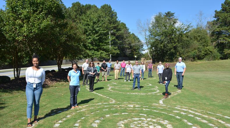 Johns Creek staff, Recreation & Parks Advisory Committee members, and community members marked the official opening of the new Bell Road Pocket Park with a recent ribbon cutting ceremony. (Courtesy City of Johns Creek)