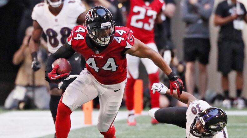 Atlanta Falcons defensive end Vic Beasley (44) recovered a Ravens fumble and returned it for a touchdown during the first half. The Atlanta Falcons played the Baltimore Ravens in a NFL football game Sunday, Dec. 2nd, 2018, at Mercedes-Benz Stadium in Atlanta, GA. BOB ANDRES / BANDRES@AJC.COM