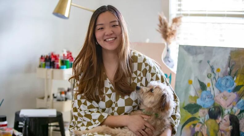 Nicole Kang in her home studio with her dog Otis. (Photo Courtesy of Isadora Pennington)