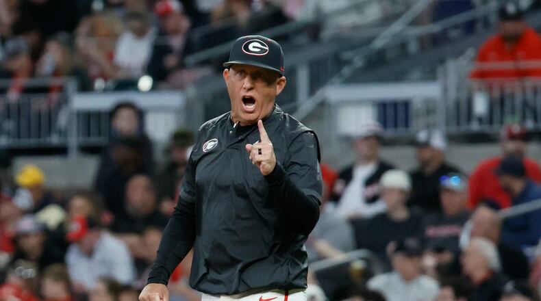 Georgia head coach Wes Johnson reacts against third base umpire after as he walks to the mound during the third inning against Georgia on Tuesday, April 15, 2025, at Truist Park in Atlanta. (Miguel Martinez/AJC)