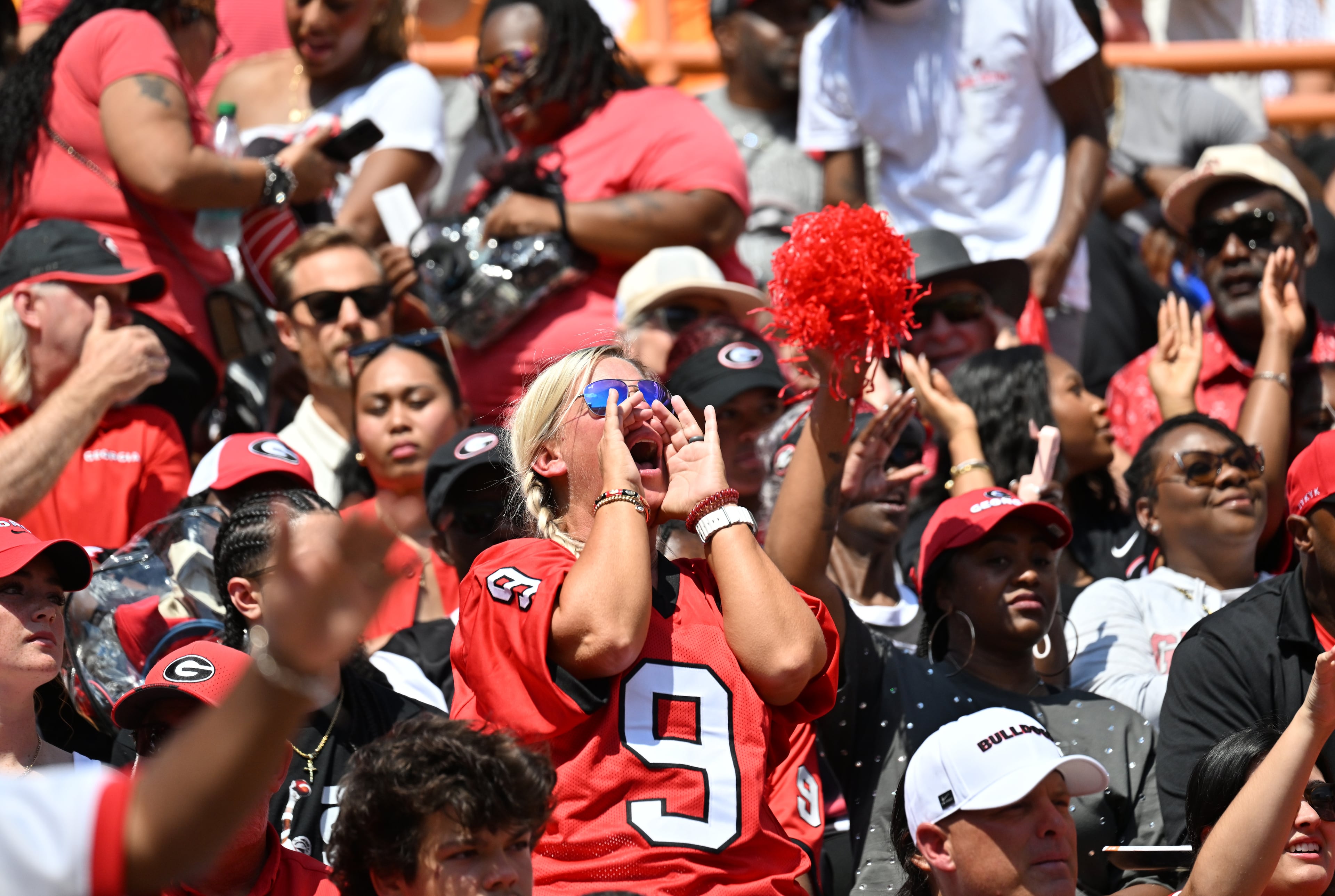 Georgia fans cheer during the pregame warm-ups before the game against Tennessee at Neyland Stadium on Saturday, Sept. 13, 2025, in Knoxville, Tenn. (Hyosub Shin/AJC)