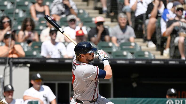 Atlanta Braves' Austin Riley hits a one-run double during the third inning of a baseball game against the Chicago White Sox, Thursday, Aug. 20, 2026, in Chicago. (AP Photo/Matt Marton)
