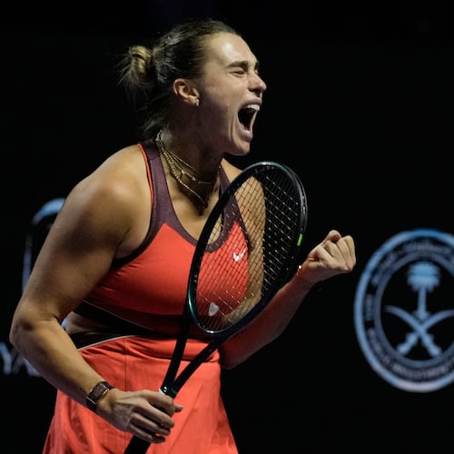 Aryna Sabalenka of Belarus celebrates after winning a point against Amanda Anisimova of the United States during their women's singles semifinal match at the WTA tennis finals in Riyadh, Saudi Arabia, Friday, Nov. 7, 2025. (AP Photo/Fatima Shbair)