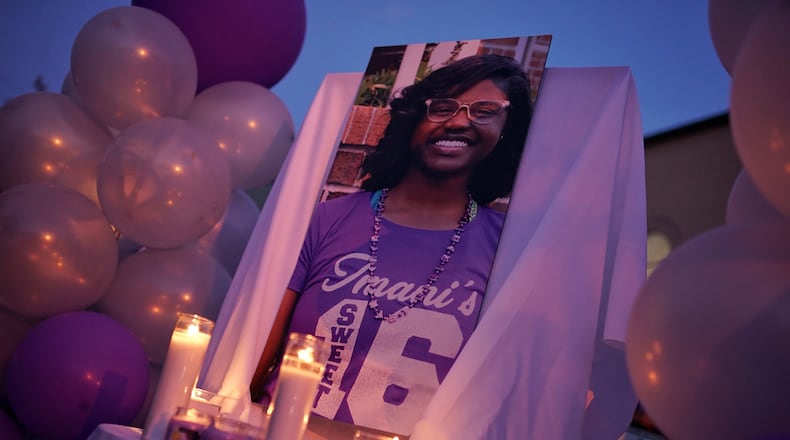 Friends and family of Imani Bell gathered for a candlelight vigil Wedneday, Aug. 21, 2019, at Dixon Grove Baptist Church in Jonesboro. The 16-year-old Clayton student died during outdoor athletic drills for Elite Scholars Academy. (Elijah Nouvelage for The Atlanta Journal-Constitution)