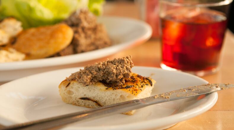 Chef Todd Ginsberg's Chopped Liver spread on a piece of pletzel bread. (styling by Chef Todd Ginsberg) (Photography by Renee Brock/Special)