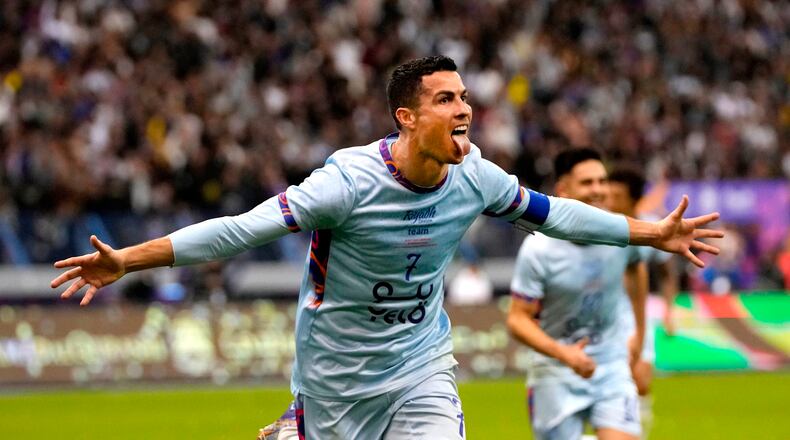 FILE - Al Nassr's Cristiano Ronaldo celebrates after scoring at the King Saud University Stadium, in Riyadh, Saudi Arabia, Jan. 19, 2023. (AP Photo/Hussein Malla, file)