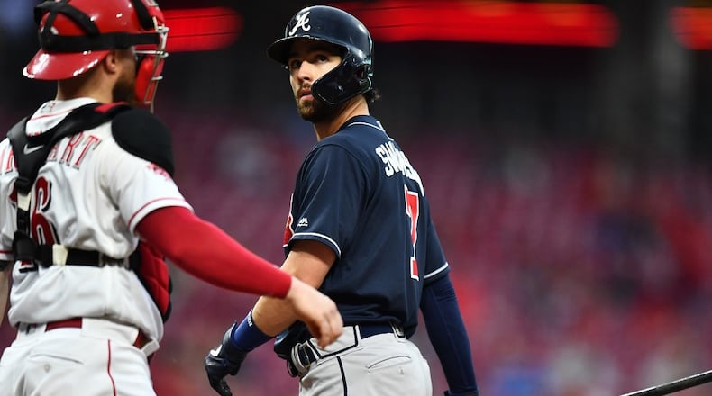Dansby Swanson of the Braves looks back at the scoreboard after striking out in the fifth inning against the Cincinnati Reds. (Photo by Jamie Sabau/Getty Images)
