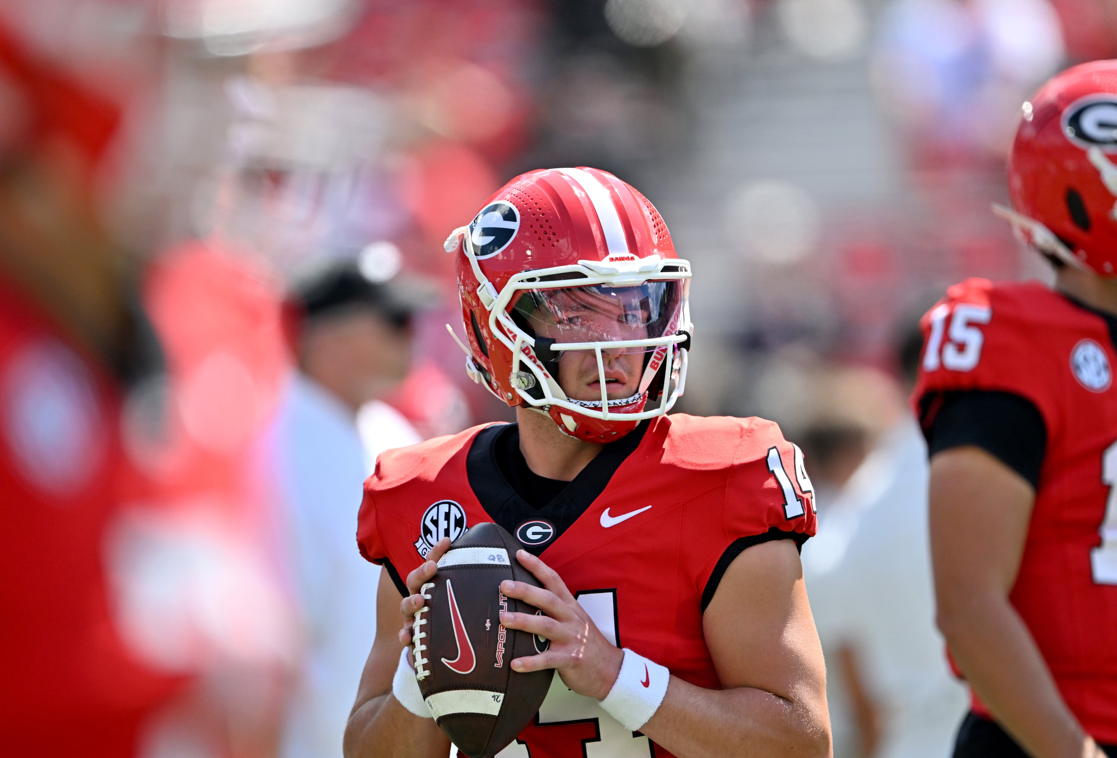 Georgia quarterback Gunner Stockton (14) warms up before Georgia football's season opener and home opener against Marshall at Sanford Stadium, Saturday, August 30, 2025, in Athens. (Hyosub Shin / AJC)