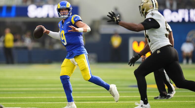 Los Angeles Rams quarterback Matthew Stafford passes under pressure from New Orleans Saints defensive end Cameron Jordan in the first half of an NFL football game Sunday, Nov. 2, 2025, in Inglewood, Calif. (Gregory Bull/AP)