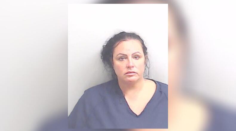 Stephanie Ferguson-Levin, 51, faces a murder charge in the stabbing death of her husband at their Johns Creek home.