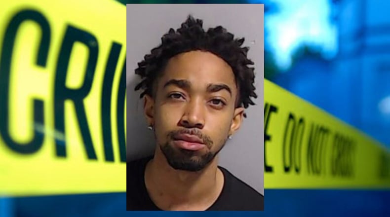 Phillip Mills is in custody after two people were fatally shot in Midtown Atlanta on Sunday.