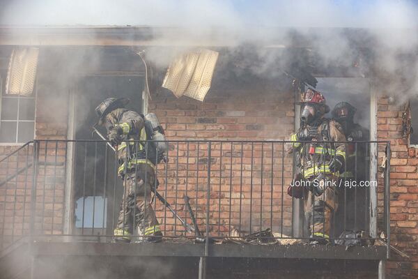 Two separate buildings were on fire when crews arrived.