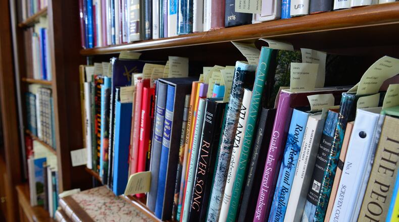First edition books by Georgia authors fill the shelves of the library. Other special pieces in the library include a mahogany card table made in Philadelphia (circa 1815) with serpent legs that once belonged to Declaration of Independence signer George Walton, the fourth governor of Georgia.