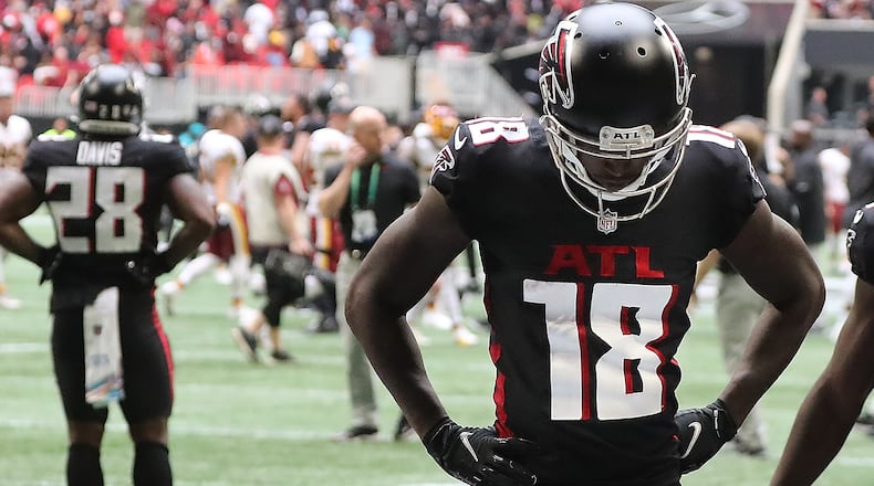 Falcons receiver Calvin Ridley (18) walks off the field after Atlanta fell 34-30 to the Washington Football Team on Oct. 3 at Mercedes-Benz Stadium. Ridley was suspended Monday by the NFL for betting on games. (Curtis Compton / Curtis.Compton@ajc.com)