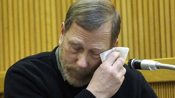 Michael Stern, the father of murder victim Sarah Stern, 19, of Neptune City, N.J., wipes tears from his eyes as he testifies for the prosecution Feb. 5, 2019, during the trial of 21-year-old Liam McAtasney at the Monmouth County courthouse in Freehold, N.J. McAtasney, a childhood friend of Sarah's, was convicted Tuesday, Feb. 26, 2019, of strangling the victim over money Dec. 2, 2016, and throwing her body off a bridge. Sarah Stern's remains have never been found.