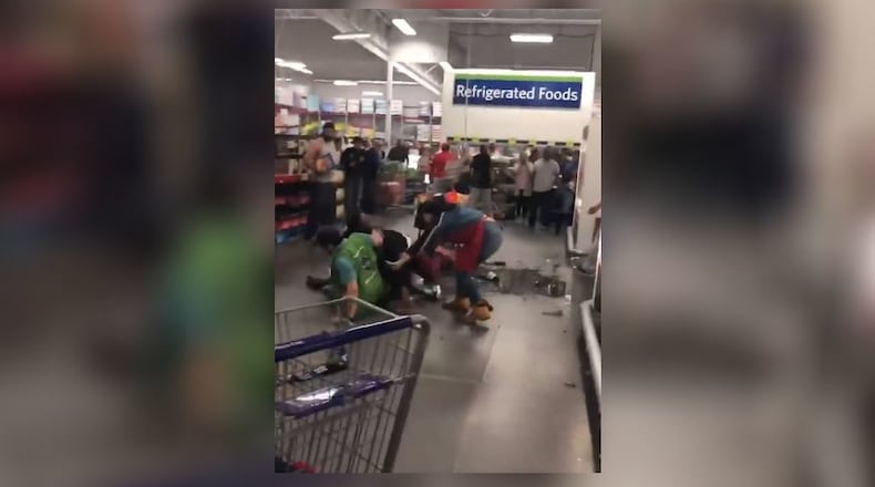 A cellphone video taken inside a Hiram Sam’s Club appeared to show part of the fight.