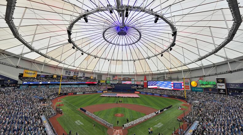 Country musician Eric Church sings the National Anthem before a baseball game between the Tampa Bay Rays and the Chicago Cubs Monday, April 6, 2026, in St. Petersburg, Fla. (AP Photo/Chris O'Meara)