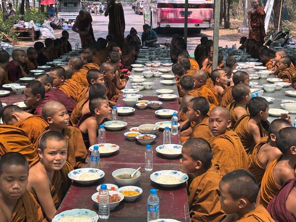 Buddhist novice monks sit under temporary shelter near a road, in the aftermath of Friday's earthquake in Mandalay, Myanmar, Wednesday, April 2, 2025. (AP Photo)