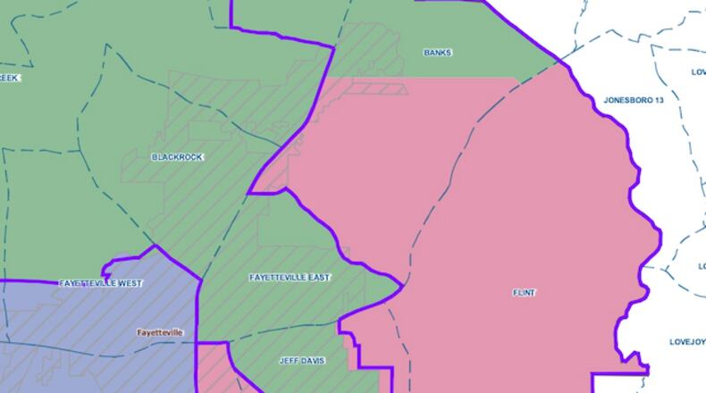A proposed change would move the eastern boundary of Fayette's District 4 (in green) into a portion of the current District 2 (in pink). Courtesy Fayette County