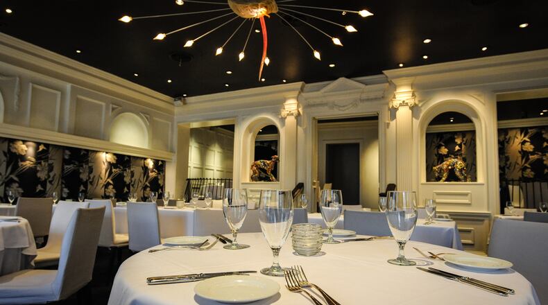 Kiss this version of Aria's dining room goodbye. / (Beckysteinphotography.com)