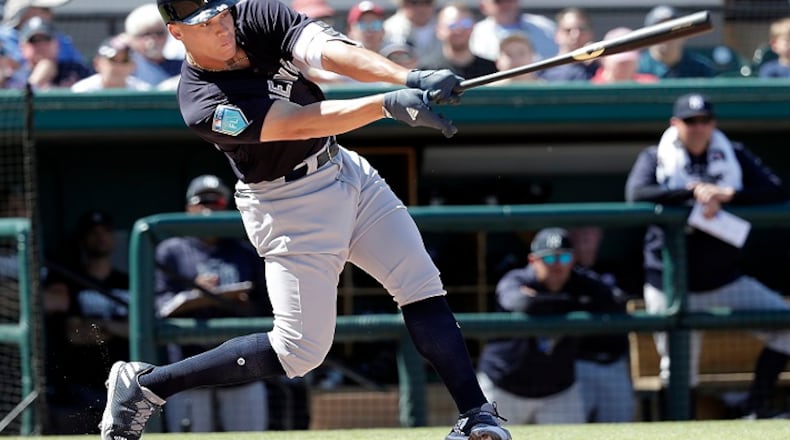 New York Yankees' Aaron Judge bats against the Detroit Tigers in the third inning of a spring baseball exhibition game, Tuesday,March 6, 2018, in Lakeland, Fla. (AP Photo/John Raoux)