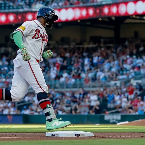 Atlanta Braves' Michael Harris II, right, rounds the bases after hitting a solo home run against the San Francisco Giants during the second inning of a baseball game, Monday, Aug. 31, 2026, in Atlanta. (AP Photo/Erik S. Lesser)