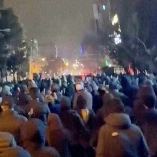 In this frame grab from footage circulating on social media from Iran showed protesters once again taking to the streets of Tehran despite an intensifying crackdown as the Islamic Republic remains cut off from the rest of the world in Tehran, Iran, Saturday Jan. 10, 2026. (UGC via AP)