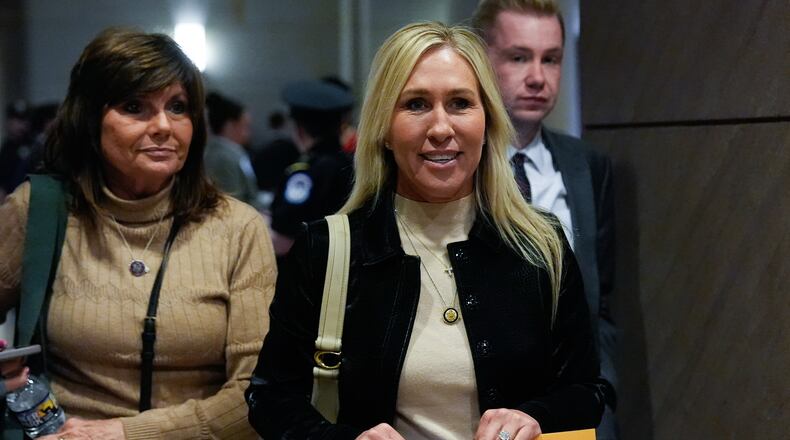 Rep. Marjorie Taylor Greene, R-Ga., departs a briefing on military strikes near Venezuela, Tuesday, Dec. 16, 2025, at the Capitol in Washington. (AP Photo/Julia Demaree Nikhinson)