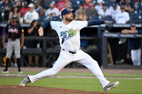 Tampa Bay Rays pitcher Cole Sulser throws during the ninth inning of a baseball game against the Atlanta Braves, Saturday, April 12, 2025, in Tampa, Fla. (AP Photo/Jason Behnken)