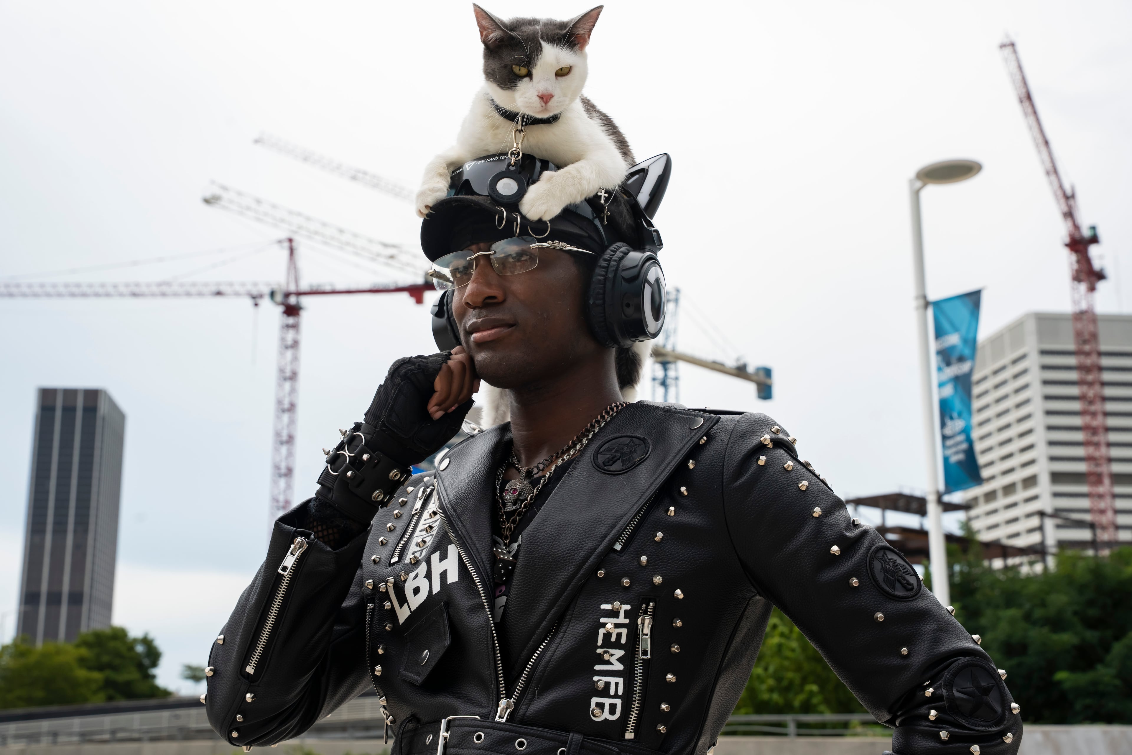 "Gothicat" (Jeremy D Smith) poses with his cat, Sandy, in line outside Beyoncé's Cowboy Carter concert in Atlanta on Thursday, July 10, 2025. (Olivia Bowdoin for the AJC)