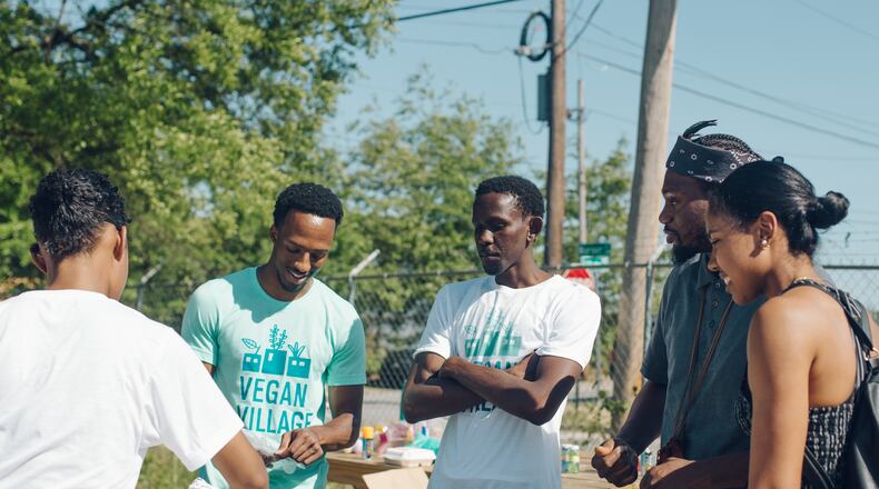 Traviel Harrison (left) and Trevor Shury are the founders of Atlanta pop-up Vegan Village. / Courtesy of Vegan Village