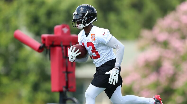 June 13, 2017, Flowery Branch: Falcons wide receiver Devin Fuller returns a kick during the first day of mini-camp on Tuesday, June 13, 2017, in Flowery Branch. Curtis Compton/ccompton@ajc.com