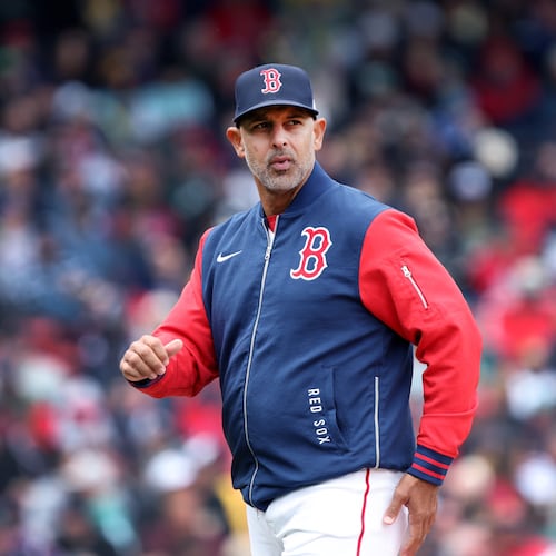 Boston Red Sox' manager Alex Cora walks back to the dugout after a mound visit during a baseball game against the Detroit Tigers, Monday, April 20, 2026, in Boston. (AP Photo/Jim Davis)