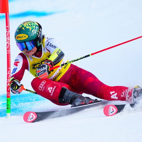 Julia Scheib, of Austria, speeds down the course as she races in the women's World Cup giant slalom in Mont Tremblant, Que., Sunday, Dec. 7, 2025. (Sean Kilpatrick /The Canadian Press via AP)