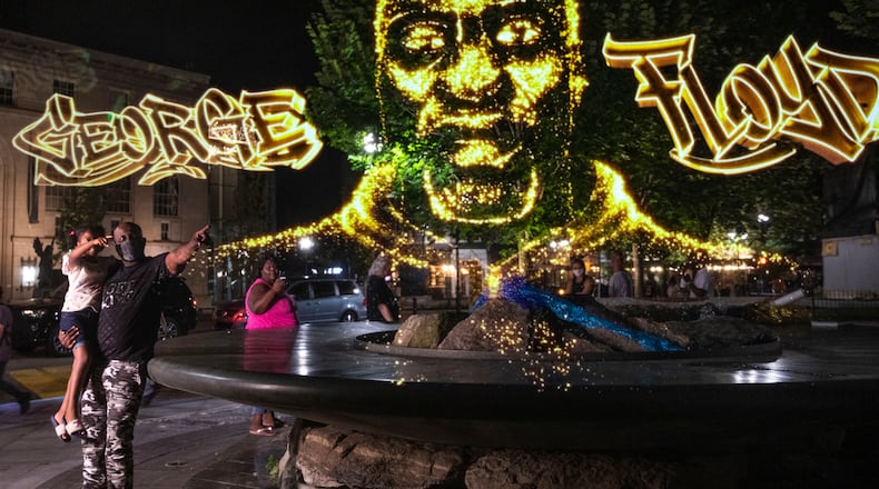 The George Floyd hologram in Asheville.