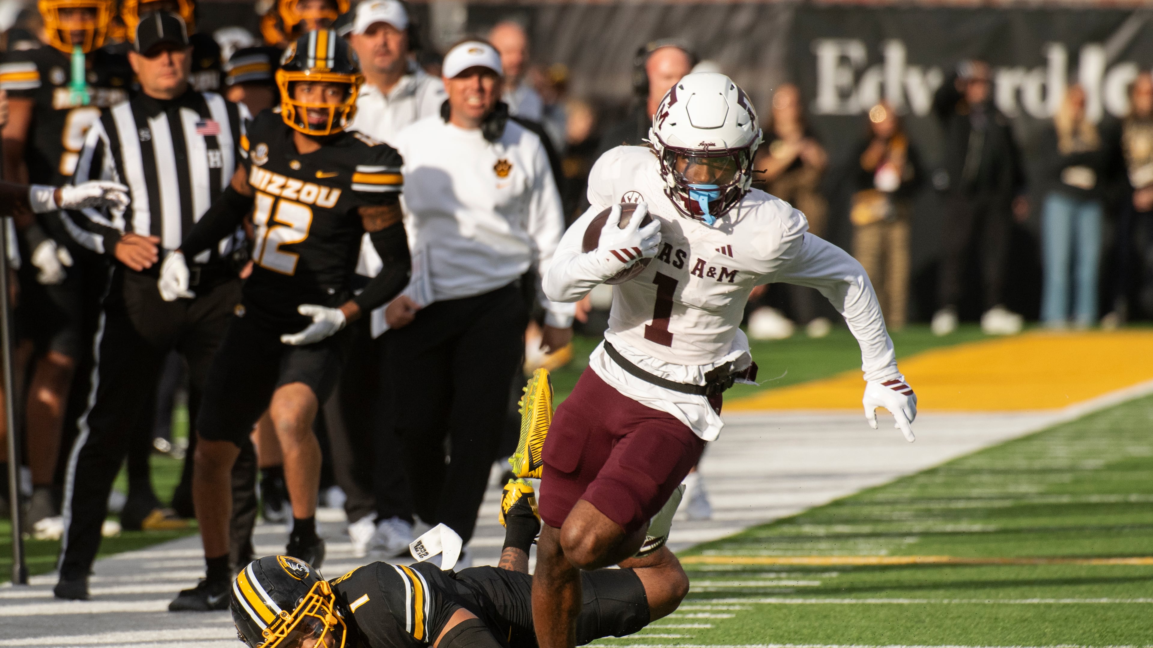 Texas A&M wide receiver Mario Craver, right, runs past Missouri safety Marvin Burks, left, during the first half an NCAA college football game Saturday, Nov. 8, 2025, in Columbia, Mo. (AP Photo/L.G. Patterson)