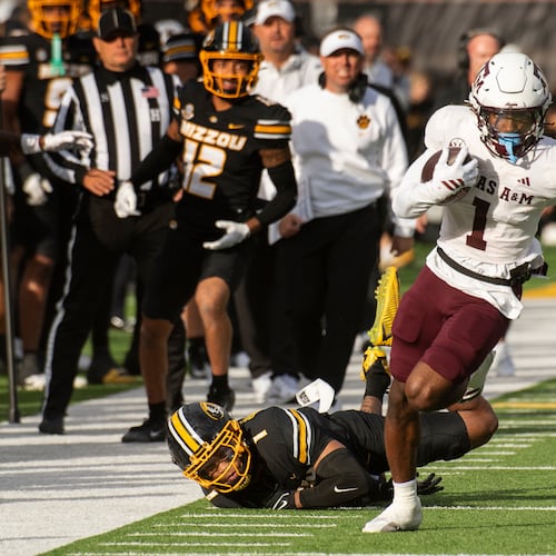 Texas A&M wide receiver Mario Craver, right, runs past Missouri safety Marvin Burks, left, during the first half an NCAA college football game Saturday, Nov. 8, 2025, in Columbia, Mo. (AP Photo/L.G. Patterson)