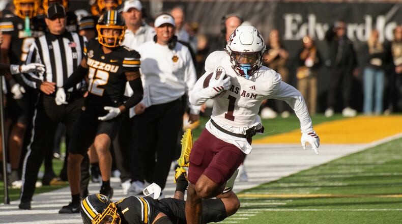 Texas A&M wide receiver Mario Craver, right, runs past Missouri safety Marvin Burks, left, during the first half an NCAA college football game Saturday, Nov. 8, 2025, in Columbia, Mo. (AP Photo/L.G. Patterson)