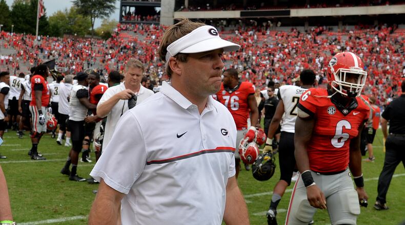 It is a long walk off the field after losing to Vanderbilt, as Kirby Smart discovers. (Brant Sanderlin/bsanderlin@ajc.com)