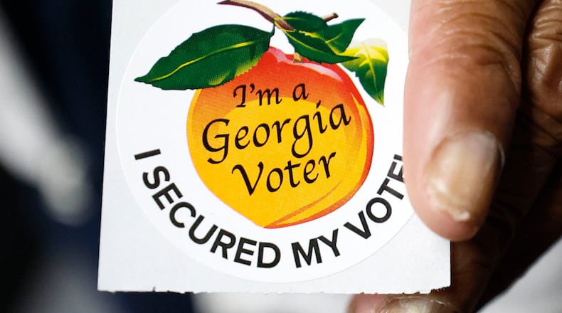 When you dig into party affiliation, 54% of Georgia Republicans think the casting and counting of votes in the upcoming 2024 Georgia elections will be more accurate compared with 2020, write several members of the Democracy Defense Project. (Miguel Martinez/AJC)