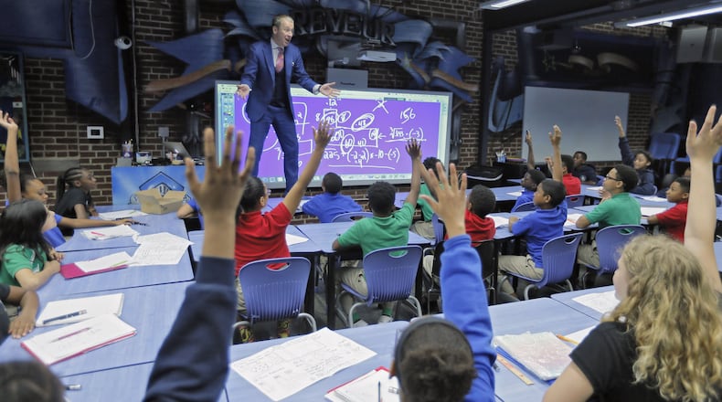 May 5, 2017 - Atlanta - With the help of a little music from La La Land, Ron Clark teaches his 5th-grade math class at the Atlanta academy that bears his name. Eccentric teaching methods have paid off at Ron Clark Academy, where teacher shortages are less common, if not unheard of. BOB ANDRES /BANDRES@AJC.COM