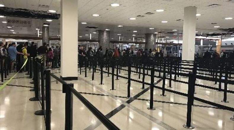 The man was boarding a flight at Hartsfield-Jackson International Airport. (Credit: Kelly Yamanouchi / AJC)