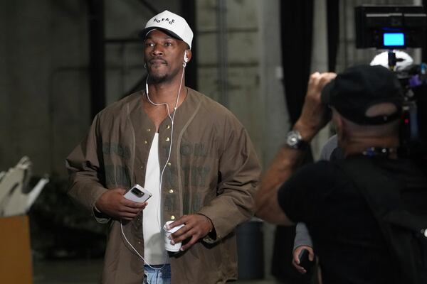Golden State Warriors forward Jimmy Butler arrives at the Kaseya Center for an NBA basketball game against the Miami Heat, Tuesday, March 25, 2025, in Miami. (AP Photo/Marta Lavandier)