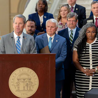 Gov. Brian Kemp speaks before signing multiple pieces of legislation inside the Georgia state Capitol on Monday. (Ben Hendren for the AJC)