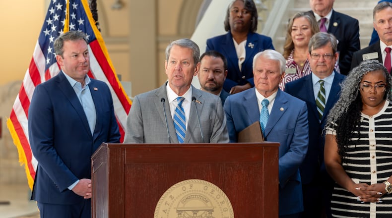 Gov. Brian Kemp speaks before signing multiple pieces of legislation inside the Georgia state Capitol on Monday. (Ben Hendren for the AJC)