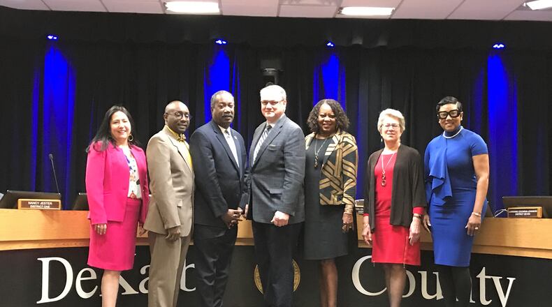 Members of the DeKalb County Board of Commissioners pose for a photo during their Jan. 15, 2019 meeting. They are (L to R) Nancy Jester, Larry Johnson, Steve Bradshaw, presiding officer Jeff Rader, Mereda Davis Johnson, Kathie Gannon and Lorraine Cochran-Johnson. (TIA MITCHELL/TIA.MITCHELL@AJC.COM)