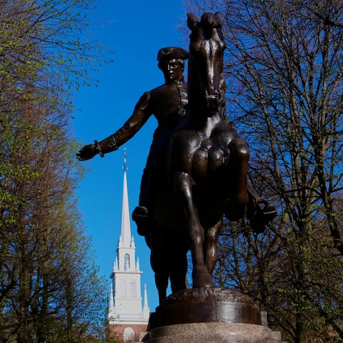 FILE - A statue of American patriot Paul Revere, famous for his 1775 ride to alert colonists of approaching British troops, stands near the Old North Church, Monday, April 20, 2026, in Boston. (AP Photo/Robert F. Bukaty, File)